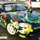 Illustration for article titled A Thousand Cars, Covered In Otaku Stickers